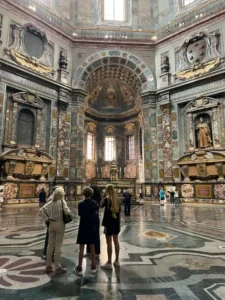 Interior of the Chapel of the Princes in the Medici Chapels, Florence, decorated with colorful marbles and grand Medici tombs