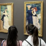 Visitors viewing Renoir’s Dance in the City and Dance in the Country at the Musée d’Orsay, part of the Renoir Exhibition 2026 Renoir and Love